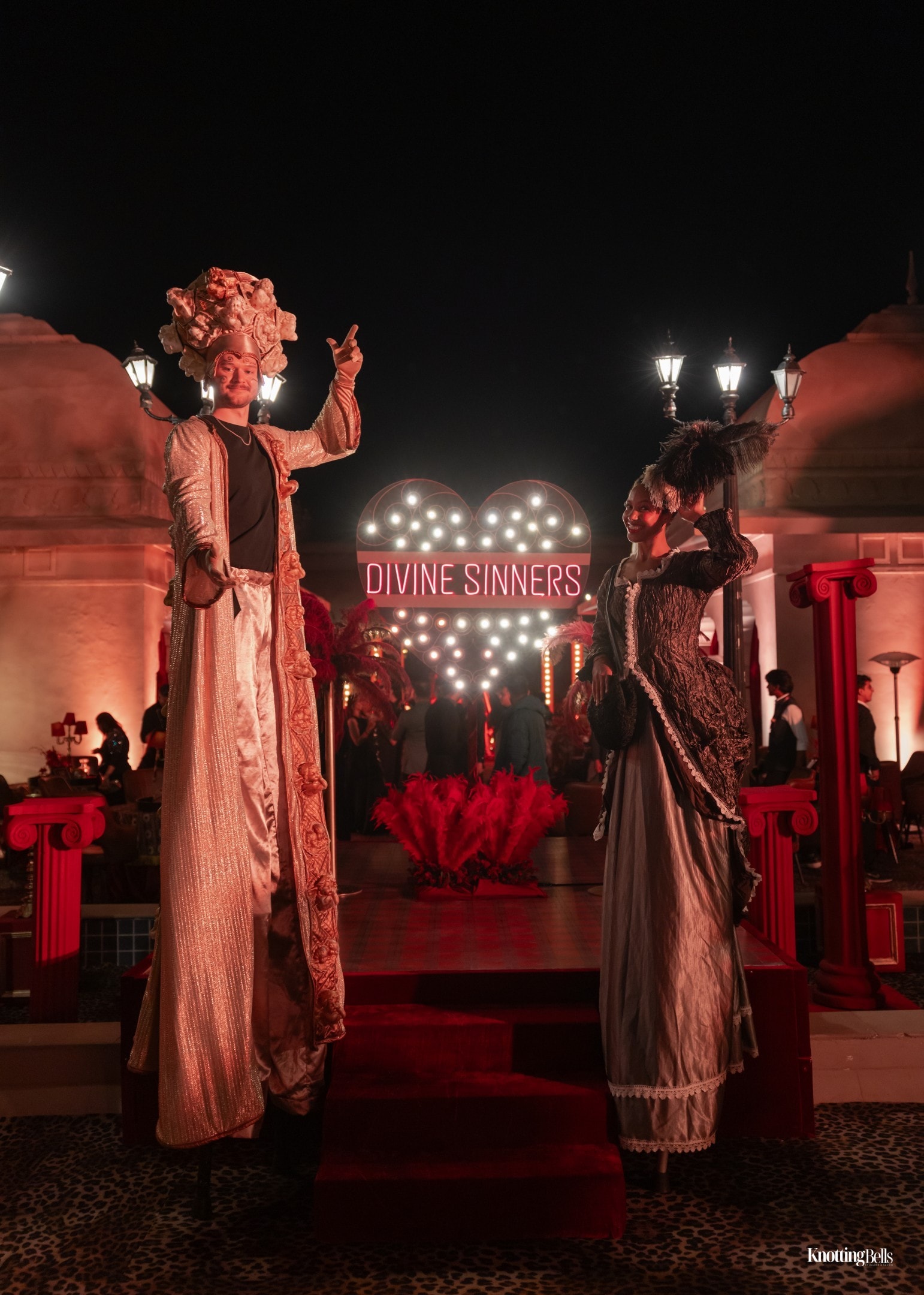 Stilt performers in costume at Divine Sinners event